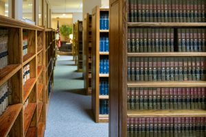 Library shelves with books