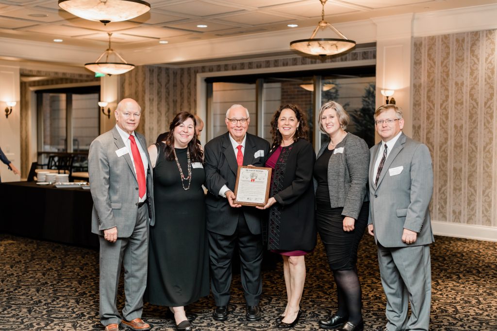 Hale Skemp attorneys pose with commendation.