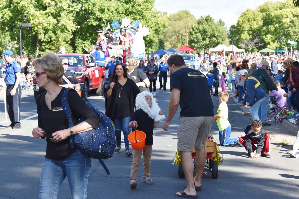 People walking in parade.